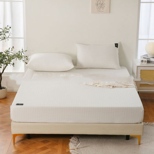 Mattress on a bed in a room with a plant and window
